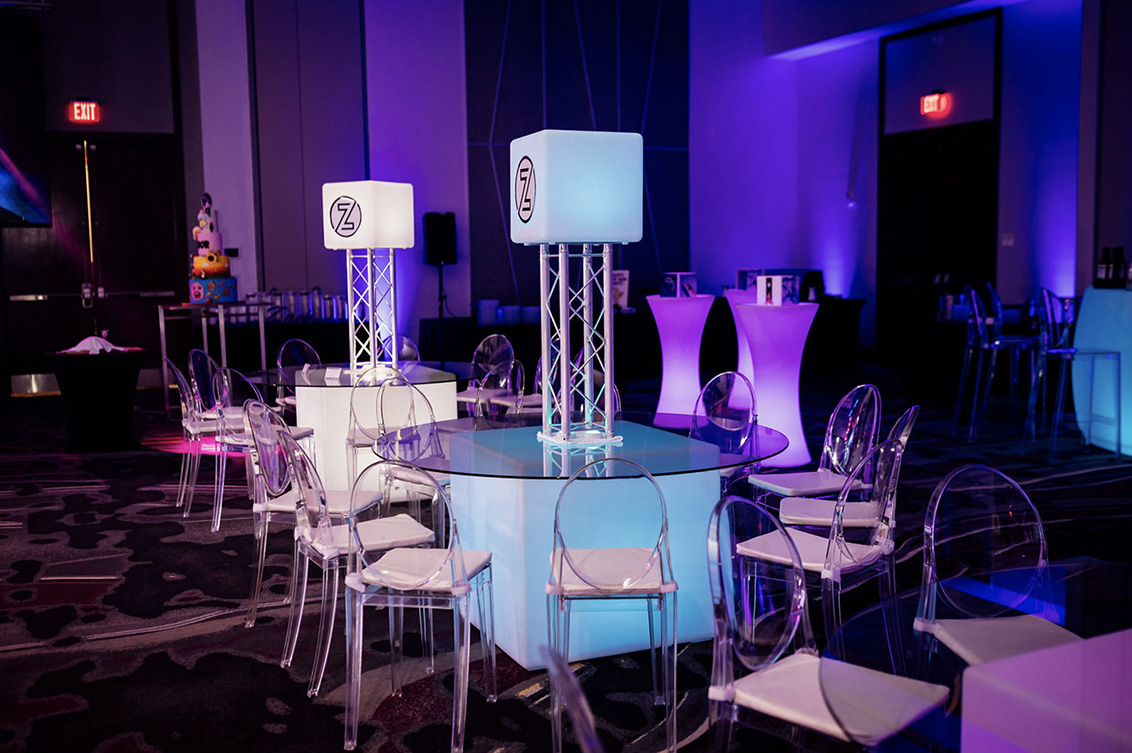 Modern lounge furniture rental setup for a Sarasota event with sofas, chairs and cocktail tables