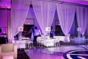 Party furniture rental Sarasota lounge setup with modern sofas and tables for events