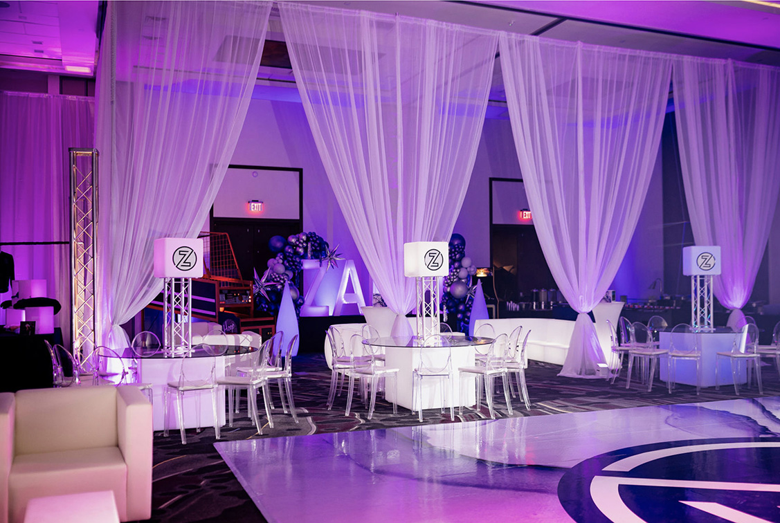 Party furniture rental Sarasota lounge setup with modern sofas and tables for events